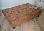 Chesterfield Extra Large Deep Buttoned Footstool in Premium Tan Faux Leather With Mahogany Turned Hardwood Legs