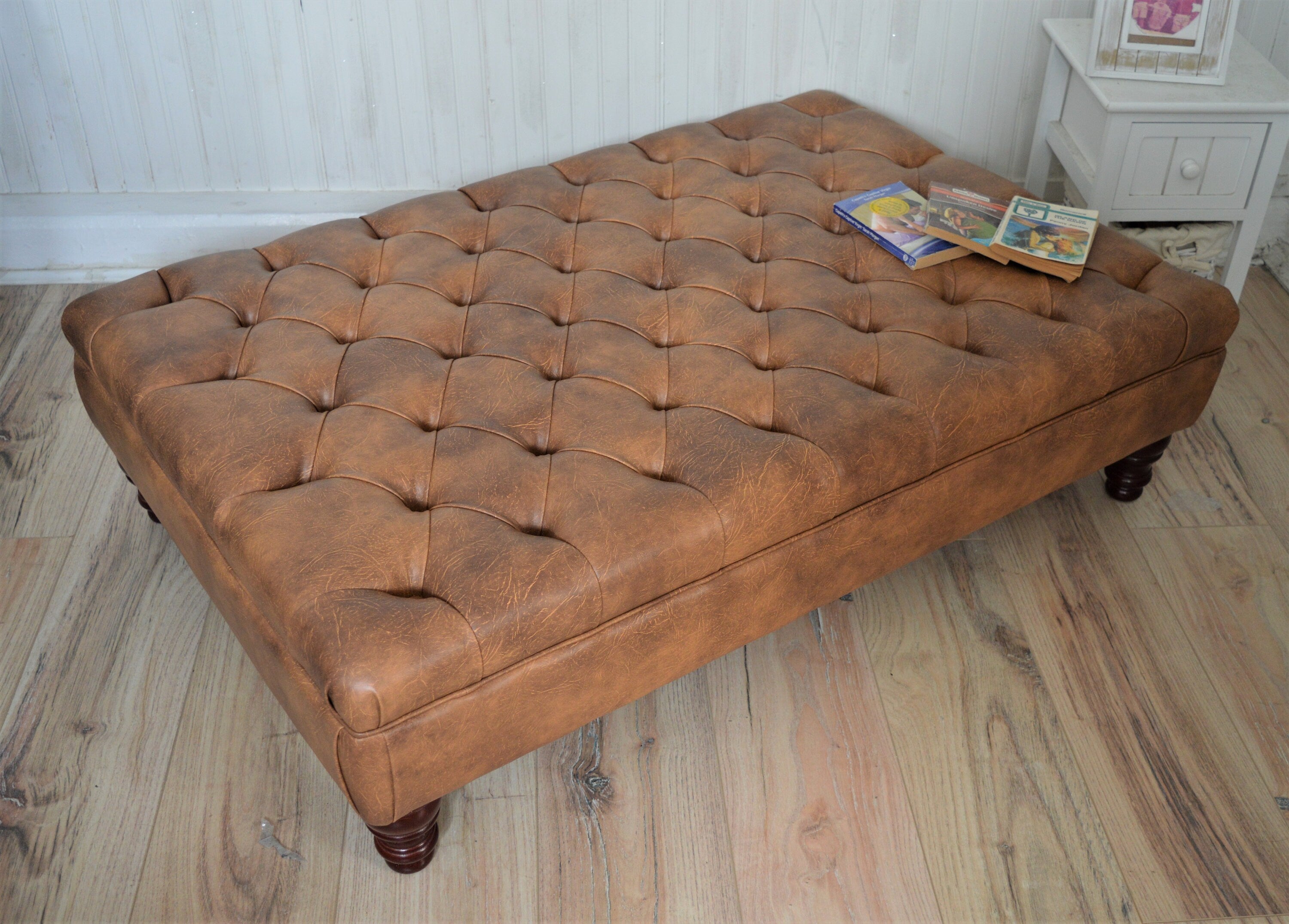 Chesterfield Extra Large Deep Buttoned Footstool in Premium Tan Faux Leather With Mahogany Turned Hardwood Legs