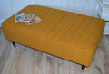 Fullted Top Footstool With Piping Trim in Turmeric Boucle Fabric With Black And Chrome HardWood Legs