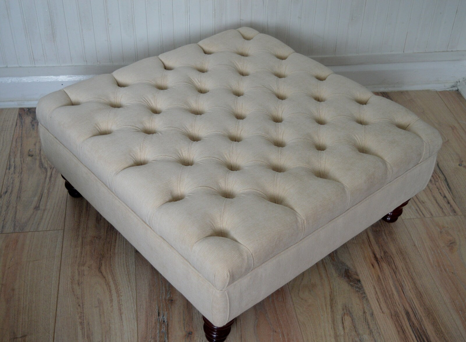Square Chesterfield Style Deep Buttoned Footstool in Casino Beige  Fabric With Turned Hard Wood Legs