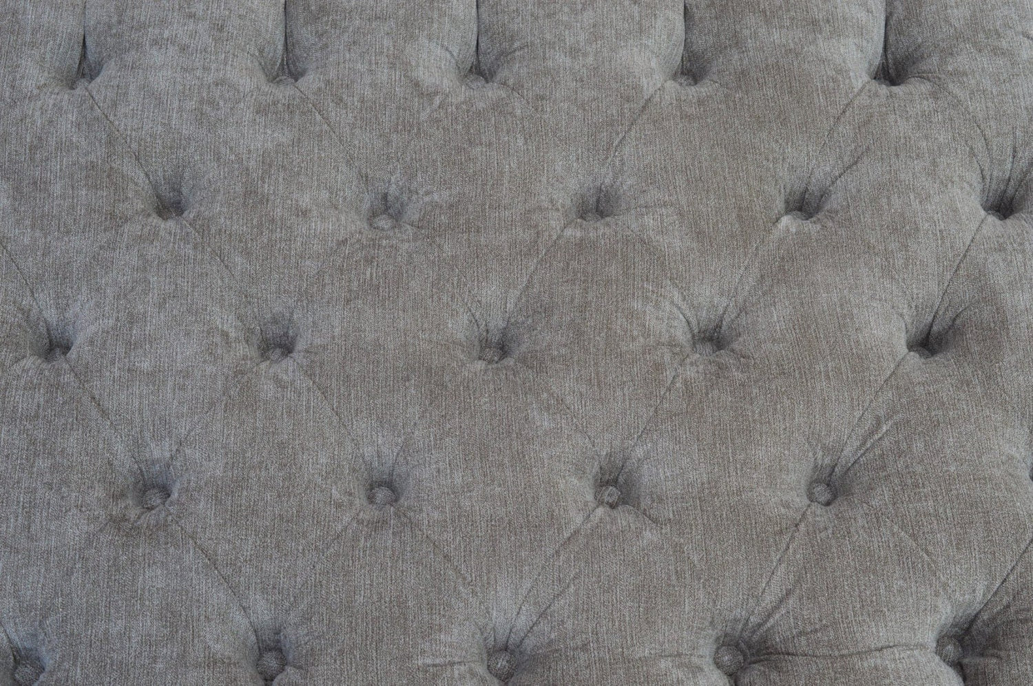 Chesterfield Style Deep Buttoned Footstool in Casino Crush Grey With Brass Castor Legs