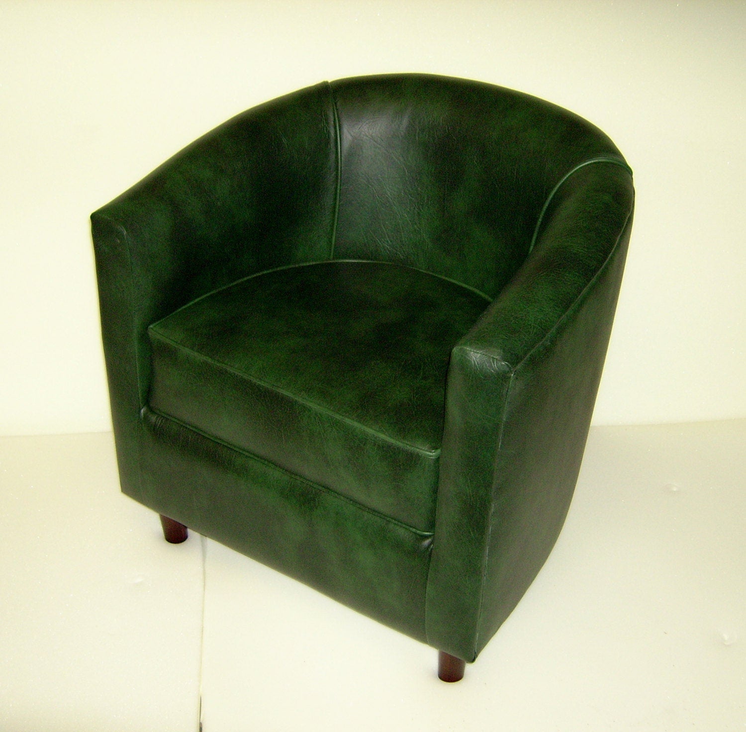 Tub Chair Upholstered In A Premium Green Faux Leather With Mahogany Wood Legs
