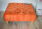 Square Chesterfield Deep Buttoned Footstool in Plush Orange Velvet With Natural Turned Hard Wood Legs