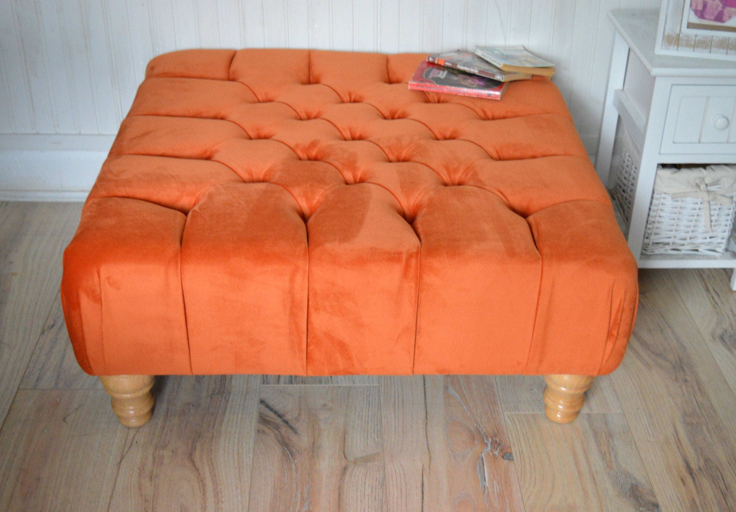 Square Chesterfield Deep Buttoned Footstool in Plush Orange Velvet With Natural Turned Hard Wood Legs