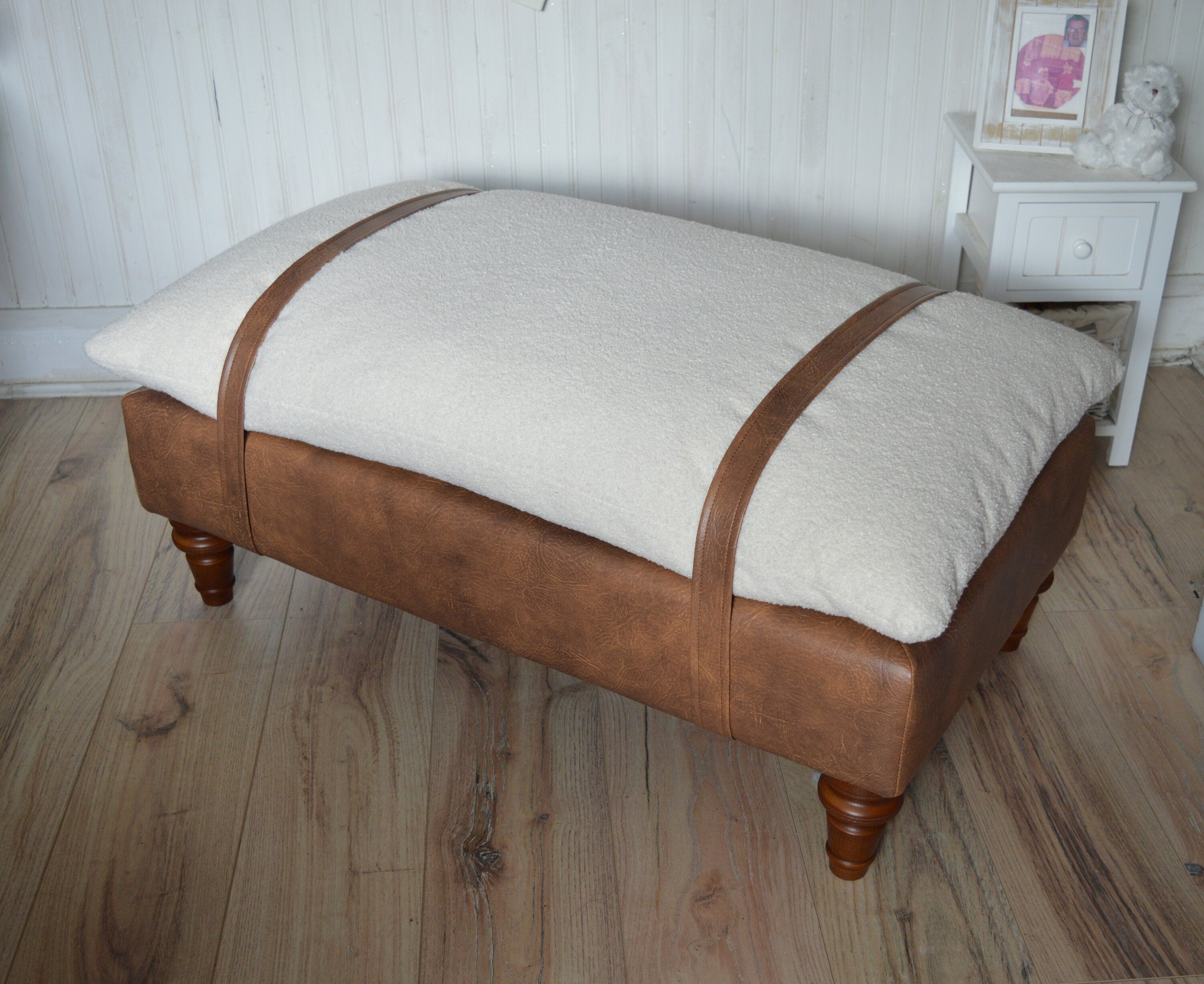 Mayfair Footstool  in Ivory Boucle Fabric And Premium Tan Faux Leather With Dark Oak Legs.