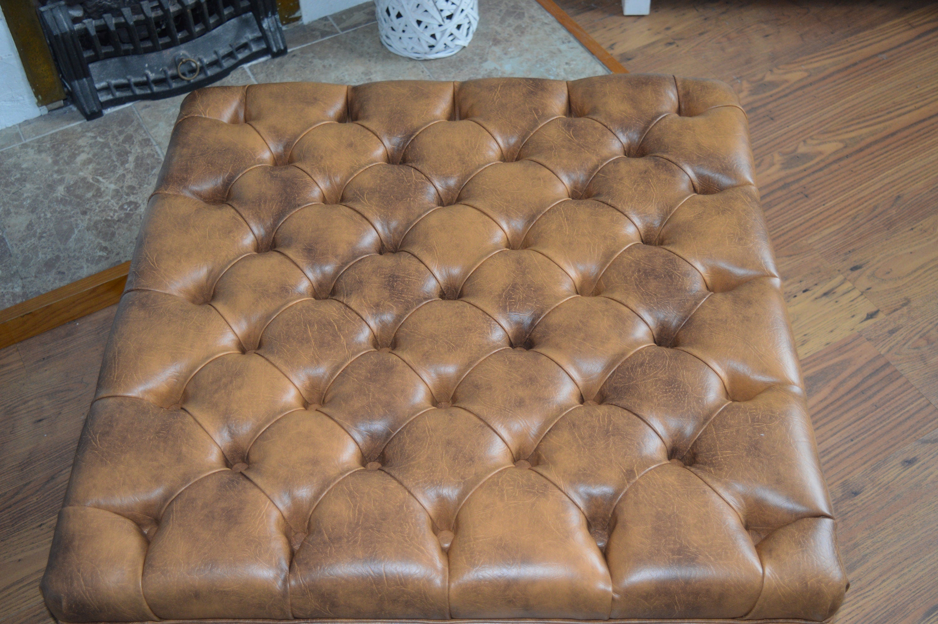 A Chesterfield Design Deep Buttoned Square Footstool in Premium Tan Faux Leather