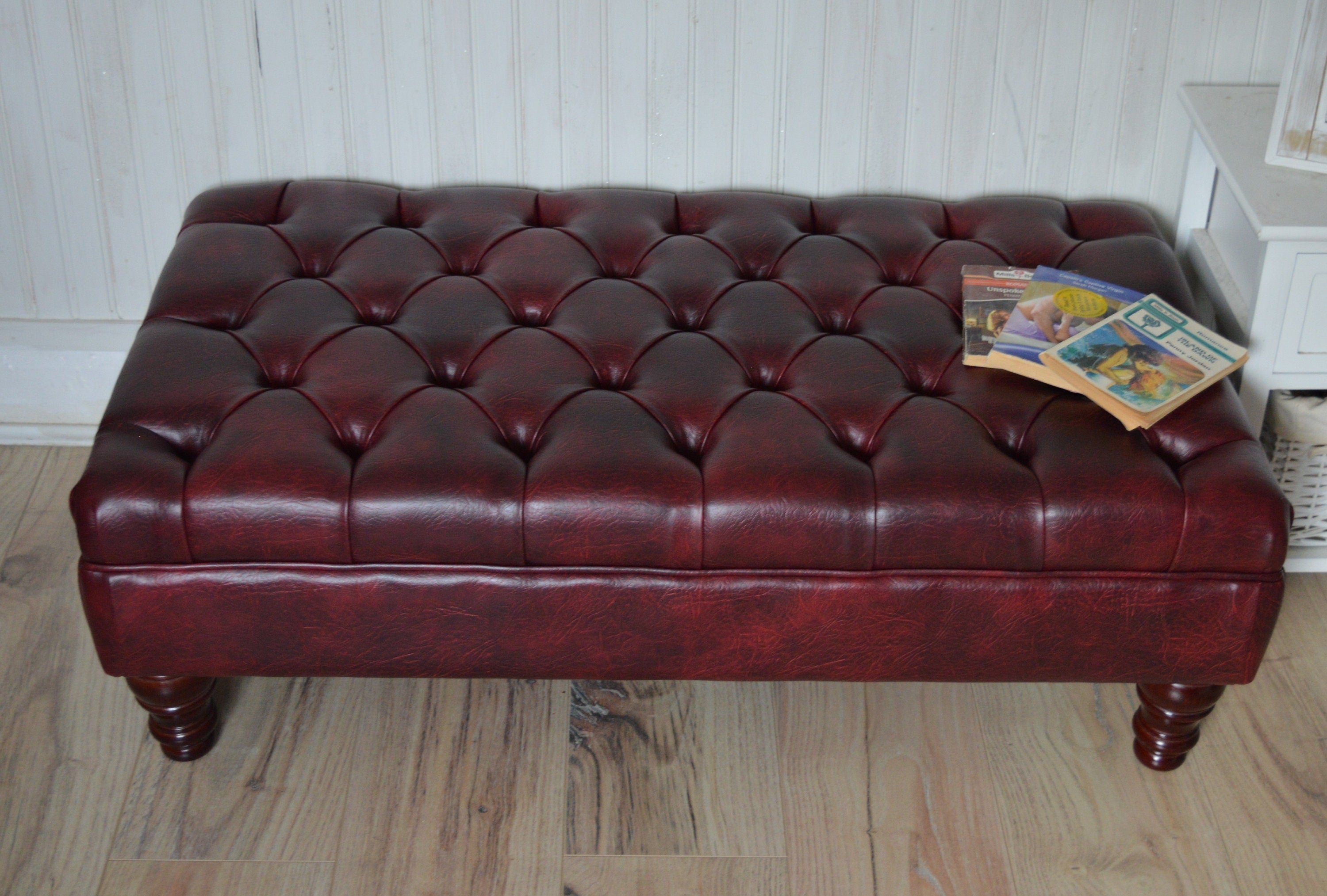 Chesterfield Style Deep Buttoned Footstool in Premium Wine Faux Leather With Turned Mahogany Hardwood Legs
