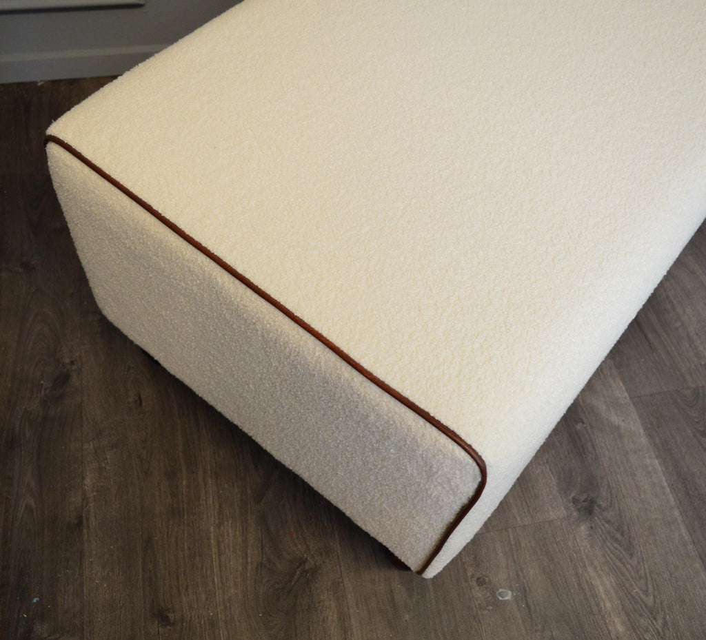 Bench Seating footstool 2str size upholstered in a Boucle Fabric With Chestnut Piping