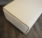 Bench Seating footstool 2str size upholstered in a Boucle Fabric With Chestnut Piping