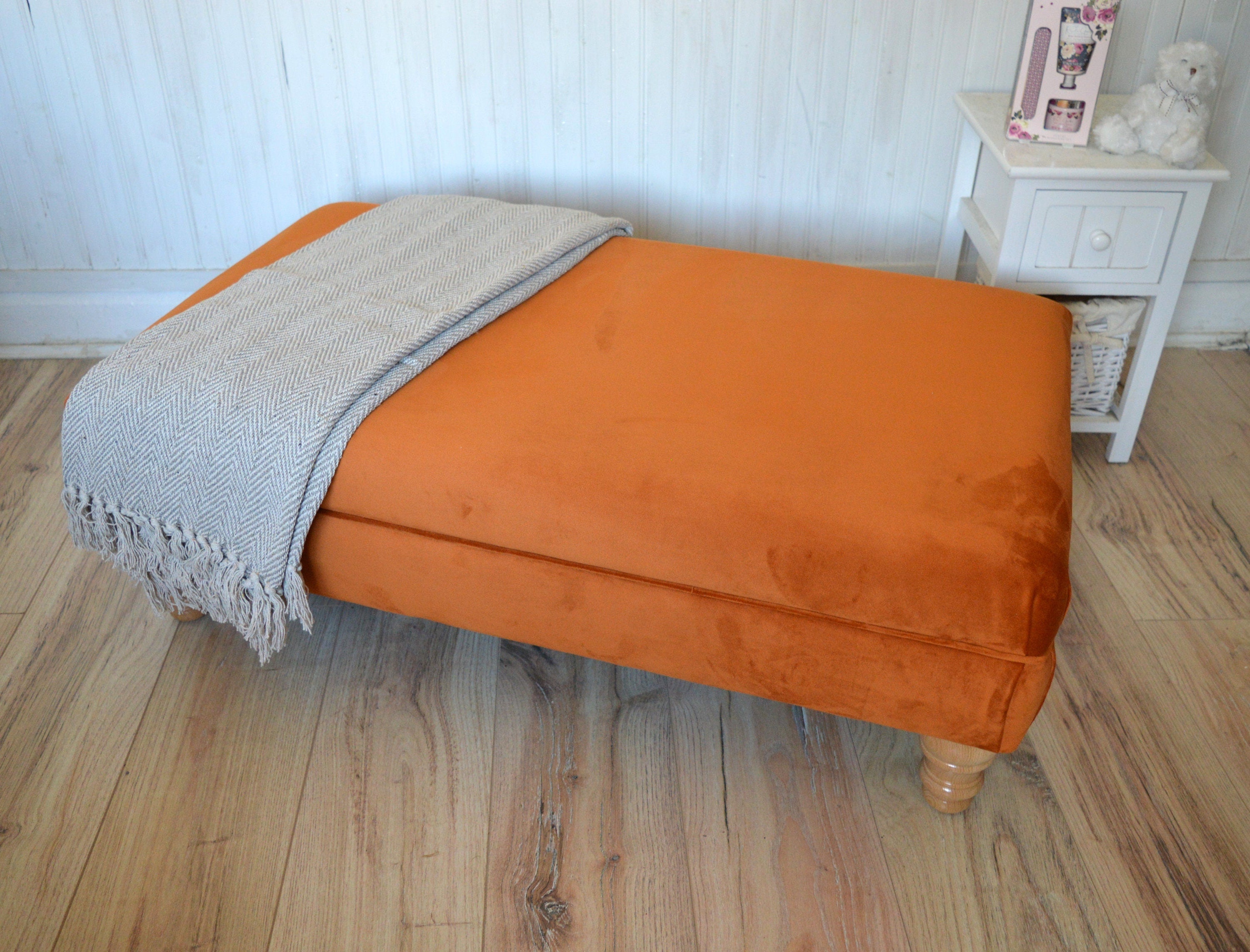 Flat Top Footstool With Piping Detail  in Burnt Orange Velvet With Oak Turned Hard Wood Legs