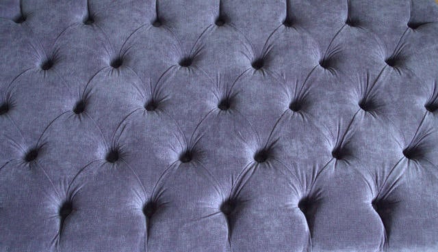 Chesterfield Style Deep Buttoned Footstool in Casino Plum Fabric With Turned Mahogany Hard Wood Legs
