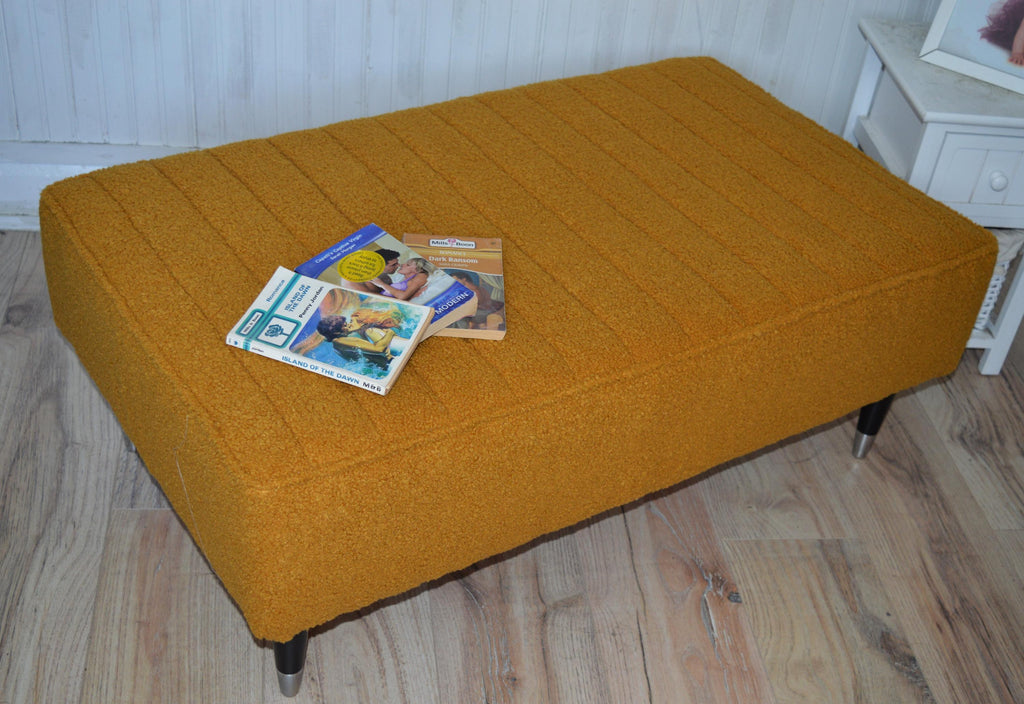 Fullted Top Footstool With Piping Trim in Turmeric Boucle Fabric With Black And Chrome HardWood Legs