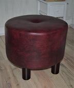 Circular round footstool upholstered in a premium wine faux leather with 4 cylinder Hard Wood Legs