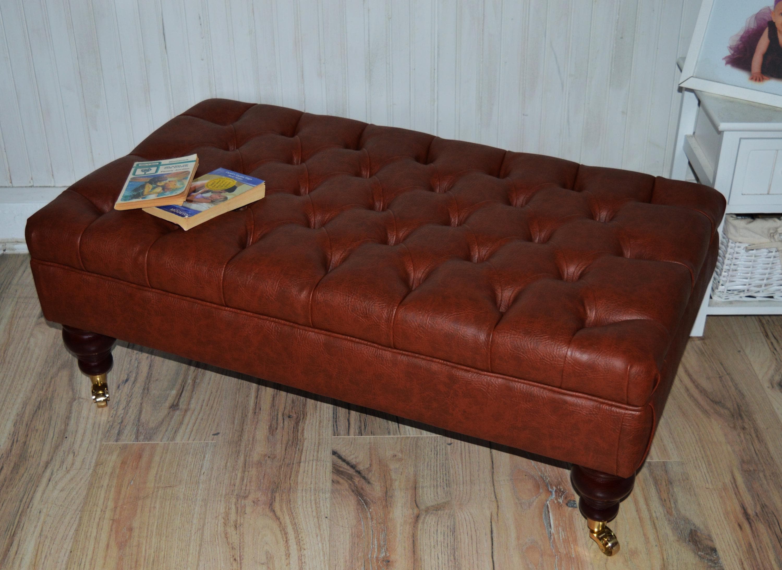 Chesterfield Design Footstool in Chestnut Brown Faux Leather With Brass Castor Turned Hardwood Legs
