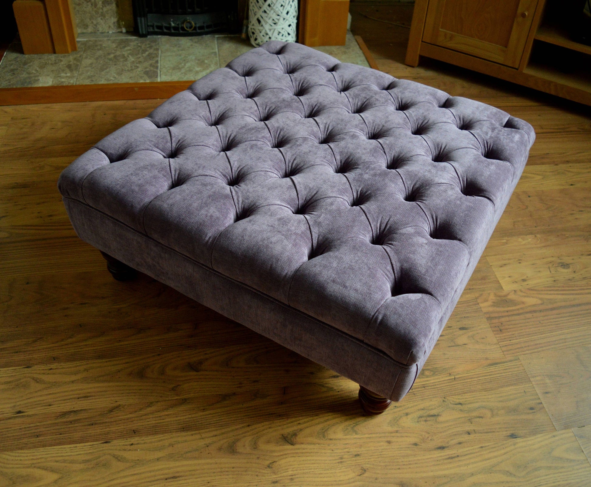 Square Chesterfield Style Deep Buttoned Footstool in Casino Plum Fabric With Turned Hard Wood Legs