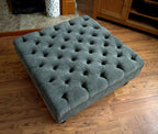 Square Chesterfield Style Deep Buttoned Footstool in Casino Dark Grey Fabric With Turned Hard Wood Legs