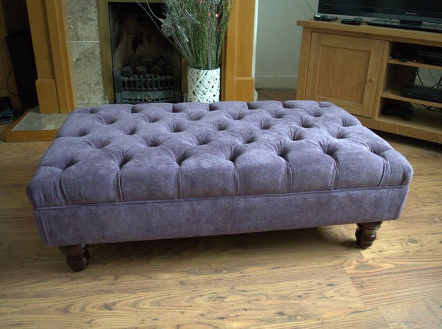Chesterfield Style Deep Buttoned Footstool in Casino Plum Fabric With Turned Mahogany Hard Wood Legs