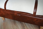 Mayfair Ottoman Footstool With Storage in Ivory Boucle Fabric With A Chestnut Faux Leather Base And Oak Turned Hardwood Legs