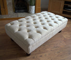Chesterfield Deep Buttoned Footstool in Casino  Beige Fabric With Turned Mahogany Wood Legs