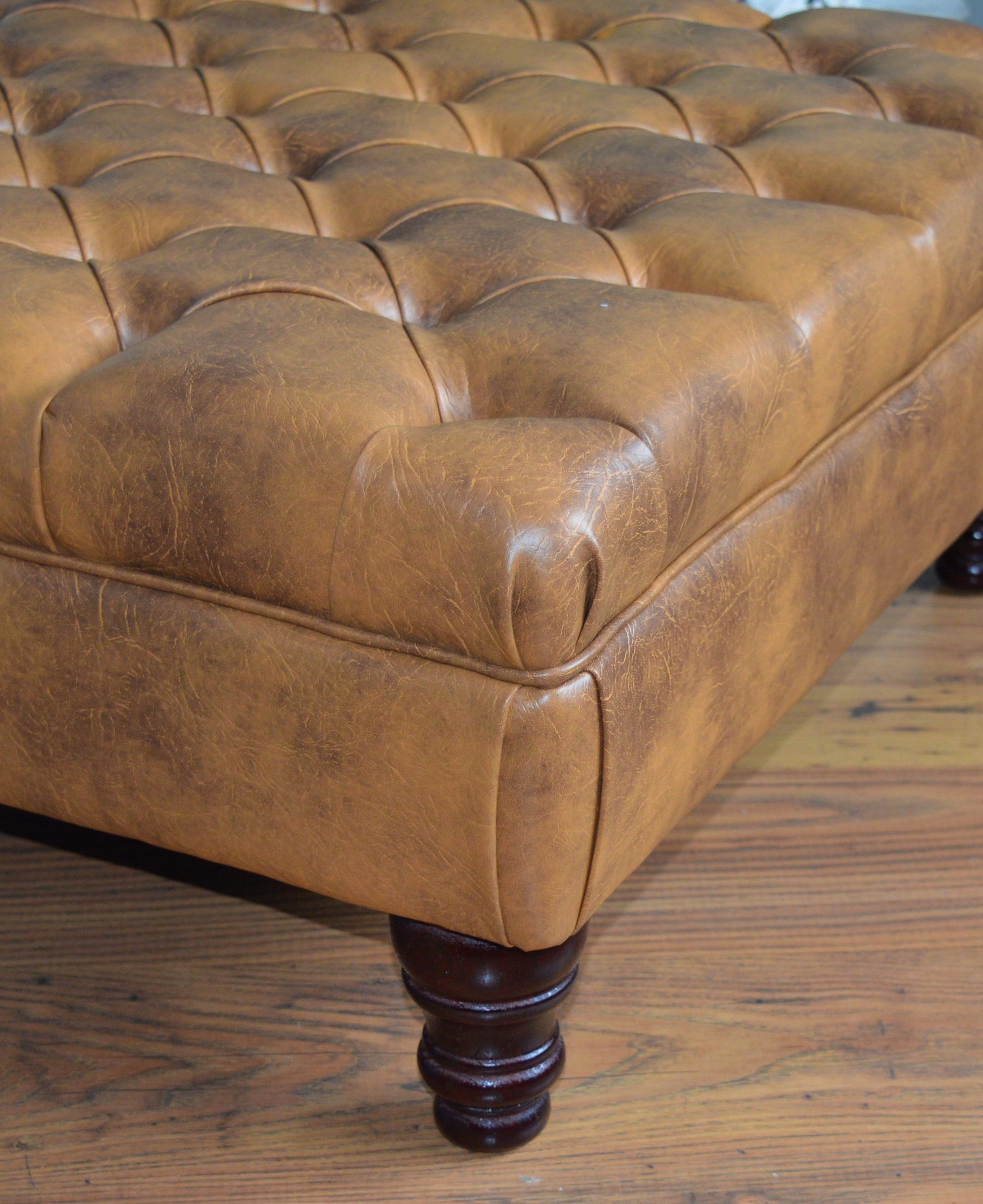 A Chesterfield Design Deep Buttoned Square Footstool in Premium Tan Faux Leather