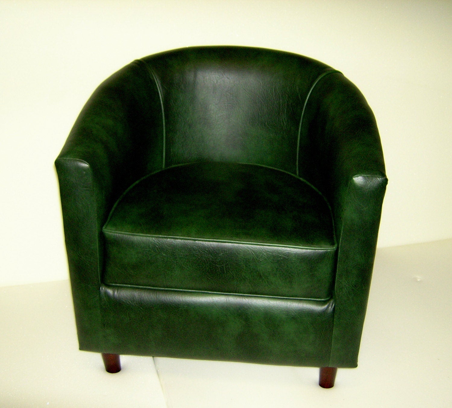 Tub Chair Upholstered In A Premium Green Faux Leather With Mahogany Wood Legs