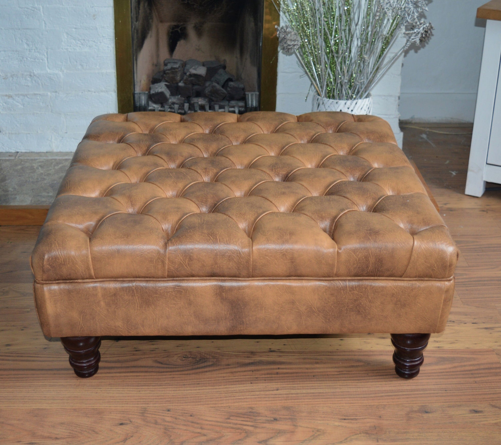 A Chesterfield Design Deep Buttoned Square Footstool in Premium Tan Faux Leather
