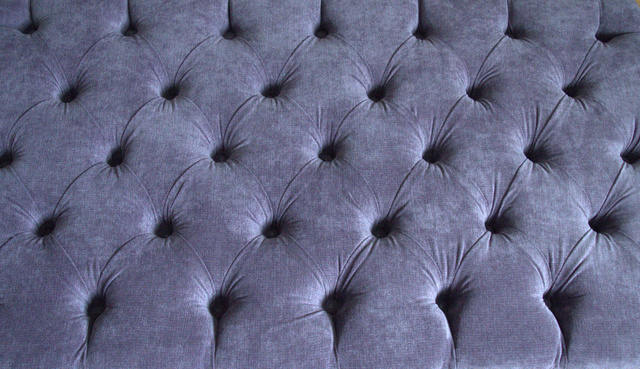 Chesterfield Style Deep Buttoned Footstool in Casino Plum Fabric With Turned Mahogany Hard Wood Legs
