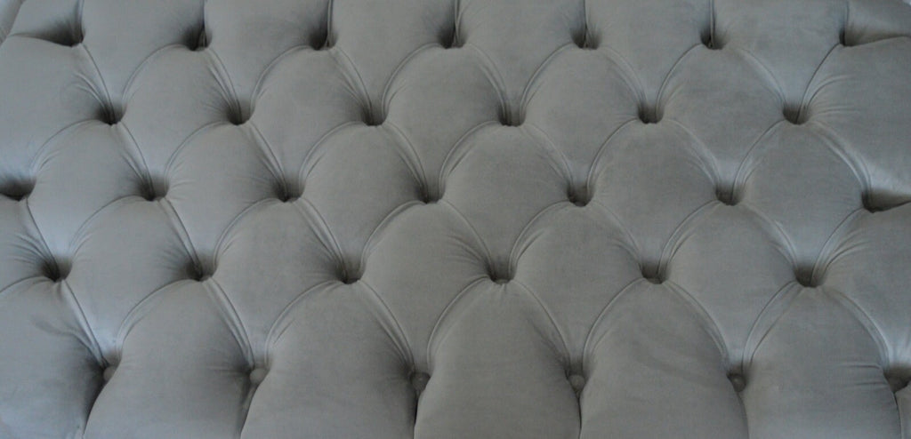 Chesterfield Deep Buttoned Footstool in a Plush Silver Velvet With Mahogany Turned Hard Wood Legs