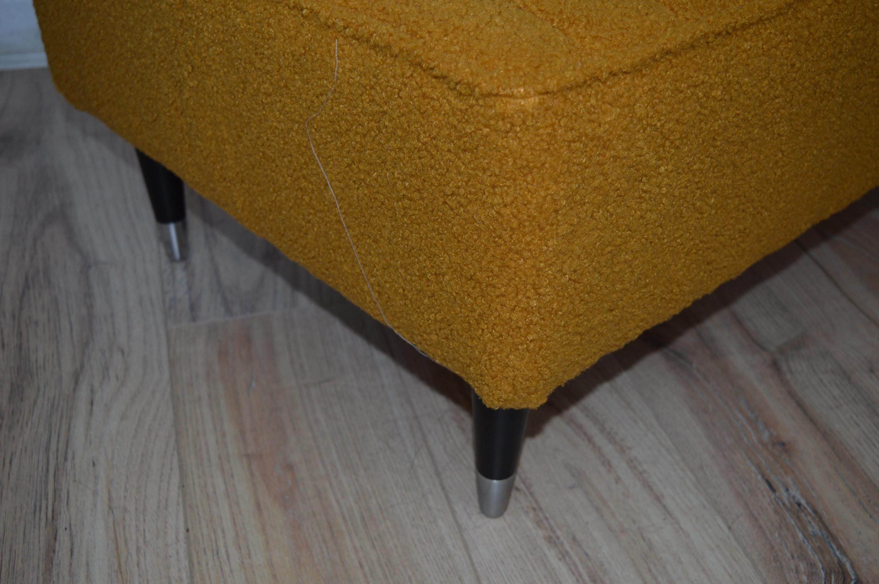 Fullted Top Footstool With Piping Trim in Turmeric Boucle Fabric With Black And Chrome HardWood Legs