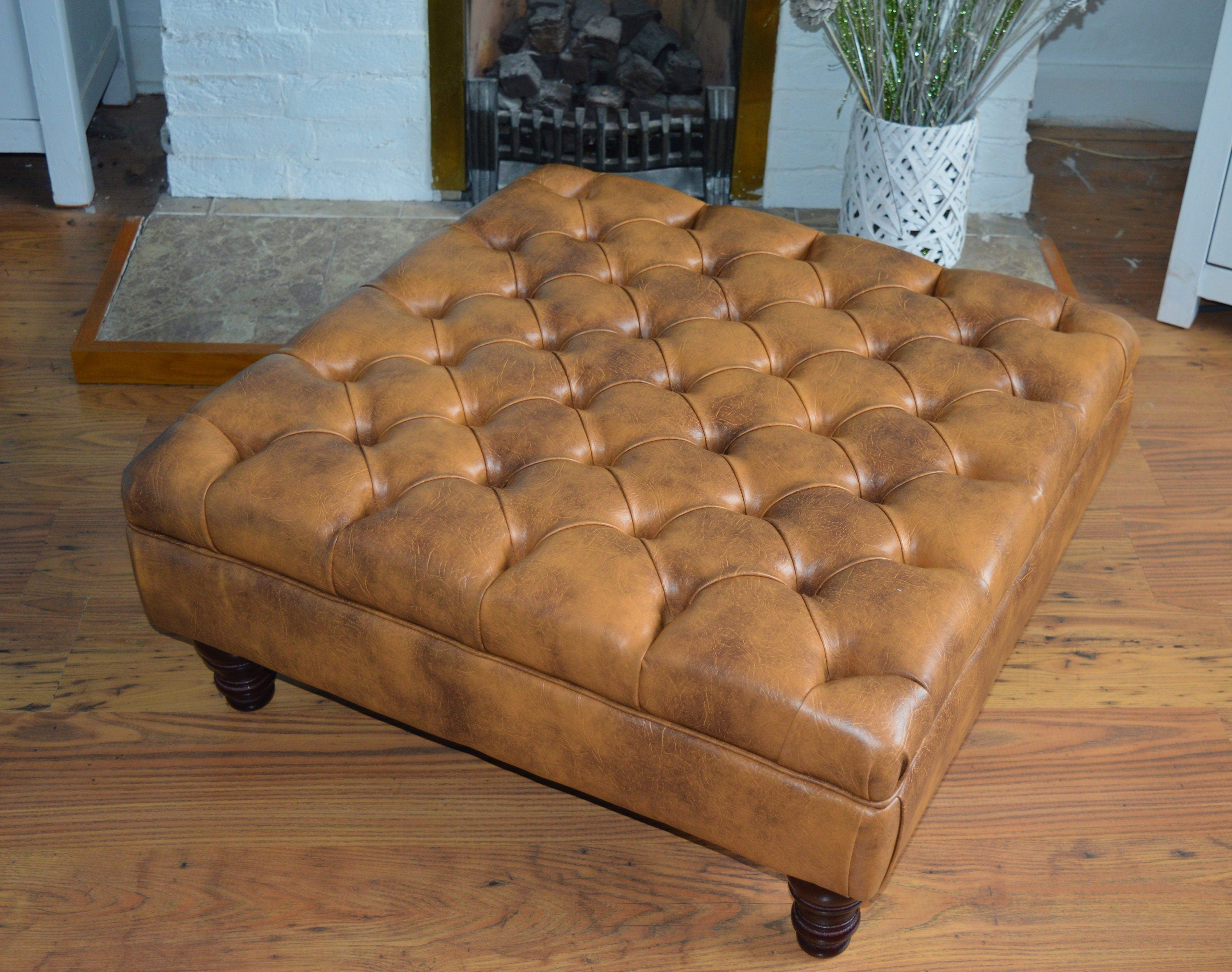 A Chesterfield Design Deep Buttoned Square Footstool in Premium Tan Faux Leather