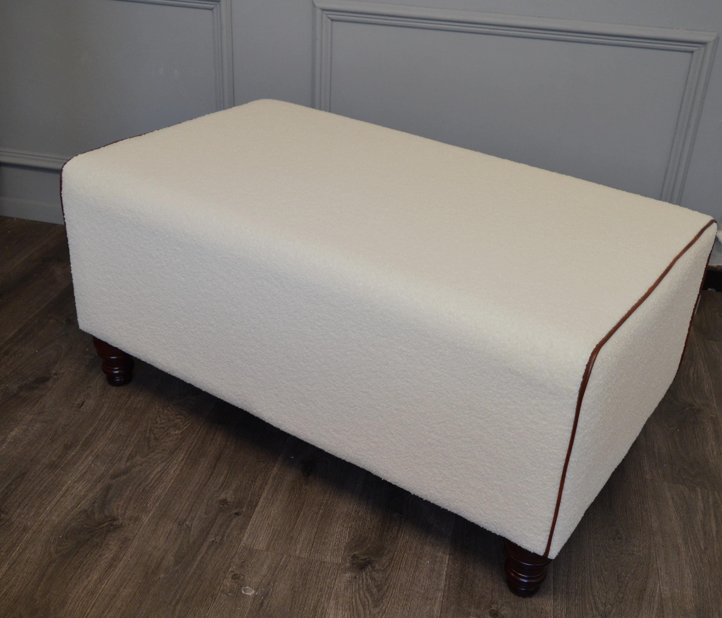 Bench Seating footstool 2str size upholstered in a Boucle Fabric With Chestnut Piping