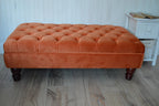 Chesterfield Deep Buttoned Footstool in Orange Velvet With Mahogany Turned Hard Wood Legs