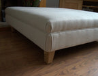 Extra Large Flat Top Footstool in 100% Danila White Sand  linen With Oak Legs Size is 100CM X 100CM