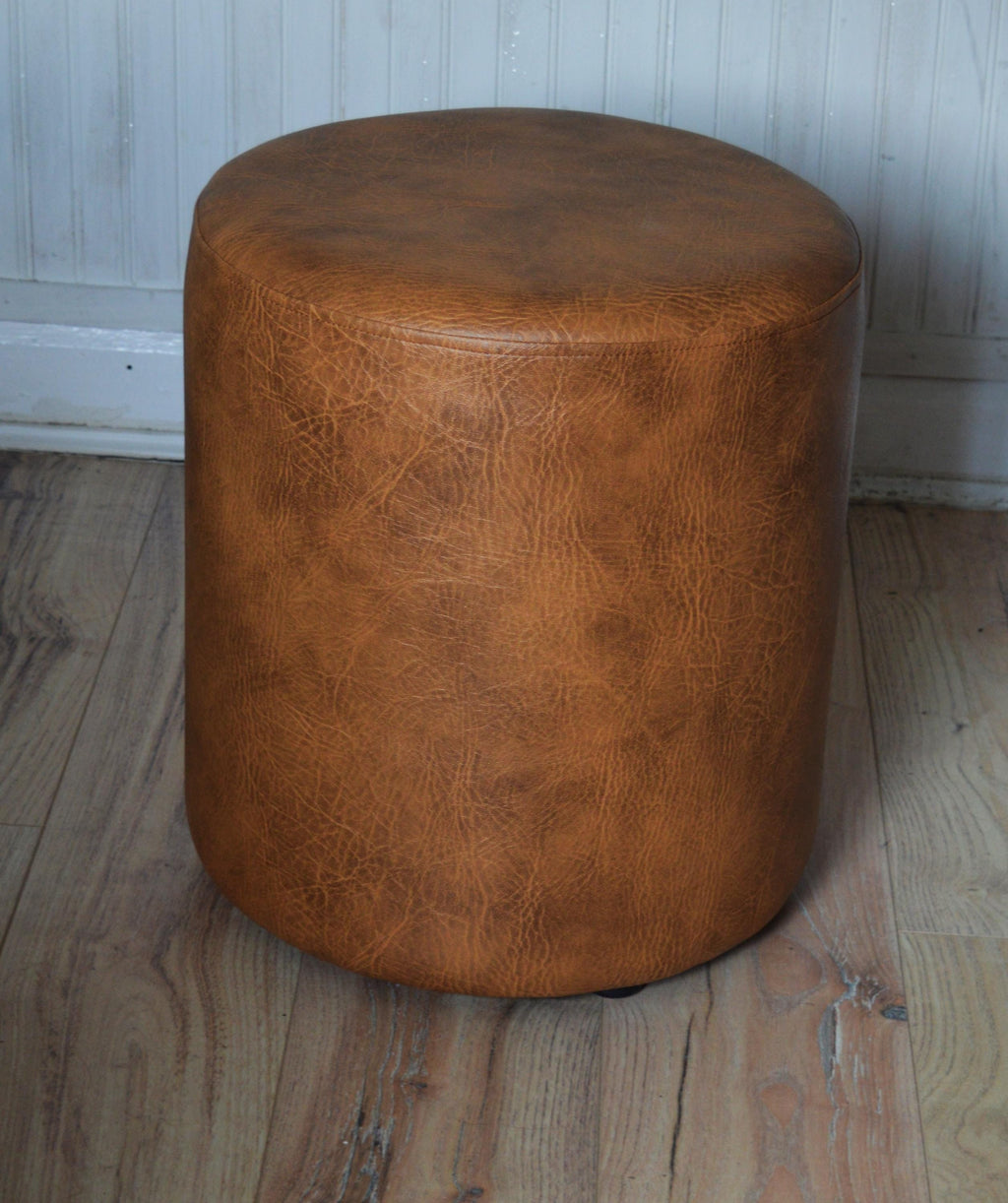 Circular round Drum footstool upholstered in Premium Tan Faux Leather
