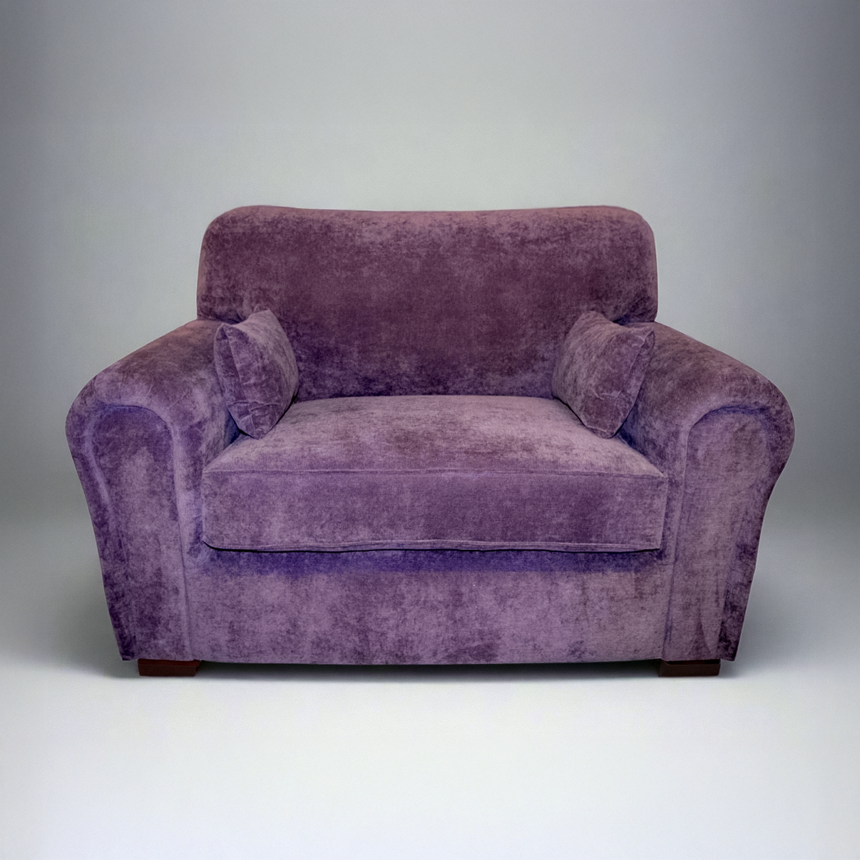 UK Made Cuddle Chair Upholstered In Casino  Plum Velvet Fabric