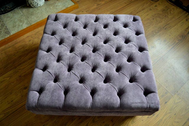 Square Chesterfield Style Deep Buttoned Footstool in Casino Plum Fabric With Turned Hard Wood Legs