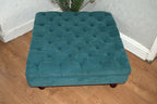 Square Chesterfield Style Deep Buttoned Footstool in Casino Crush Teal Fabric With Turned Hard Wood Legs