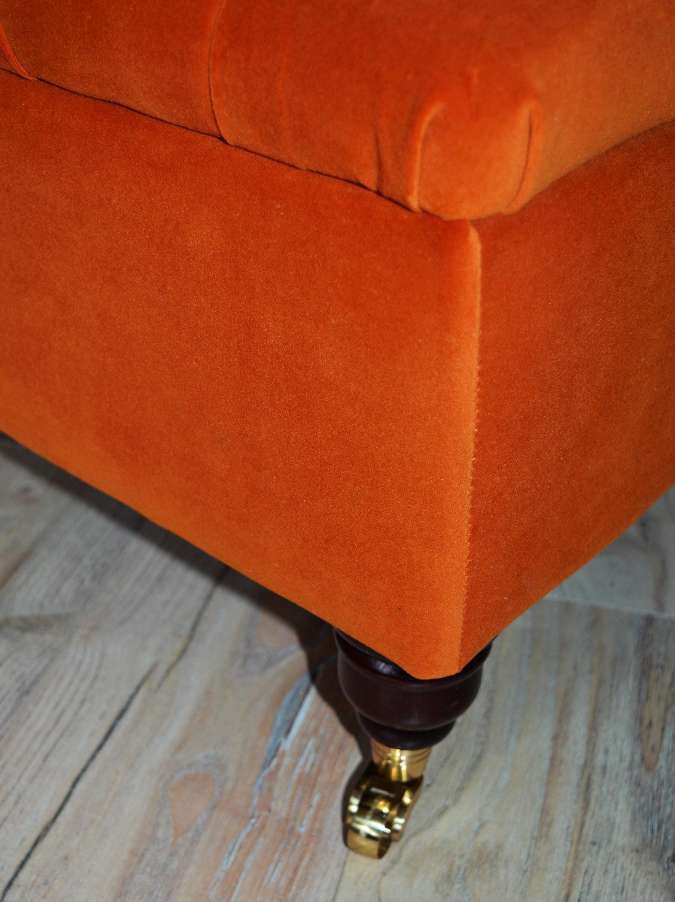 Chesterfield Deep Buttoned Footstool With Storage in Premium Eco Burnt Velvet Fabric With Brass Castor Legs.