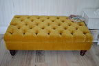 Chesterfield Deep Buttoned Footstool in a Plush Turmeric Velvet With Mahogany Turned Hard Wood Legs