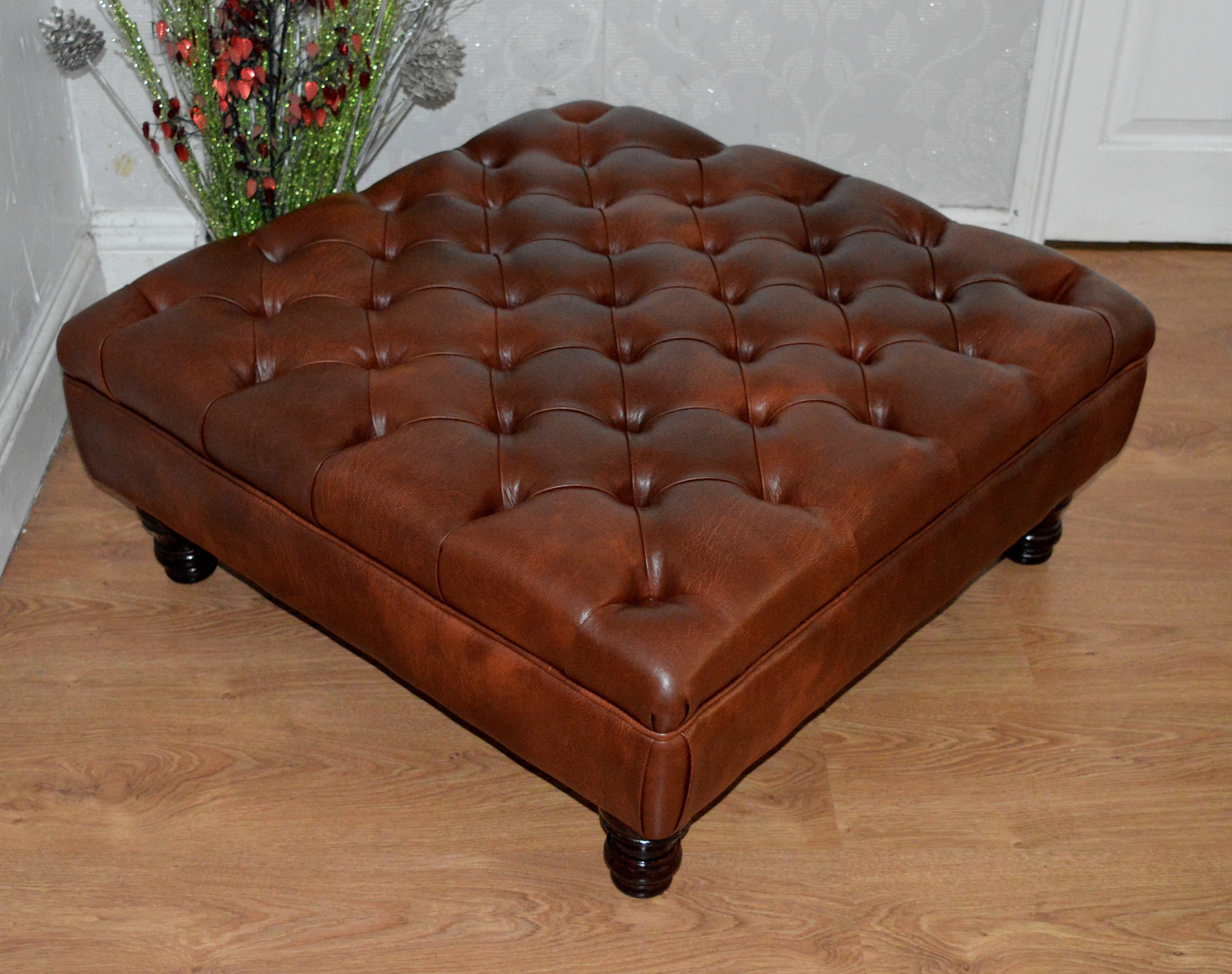 Square Chesterfield Style Deep Buttoned Footstool in Premium Chestnut Faux Leather With Turned Hardwood Legs