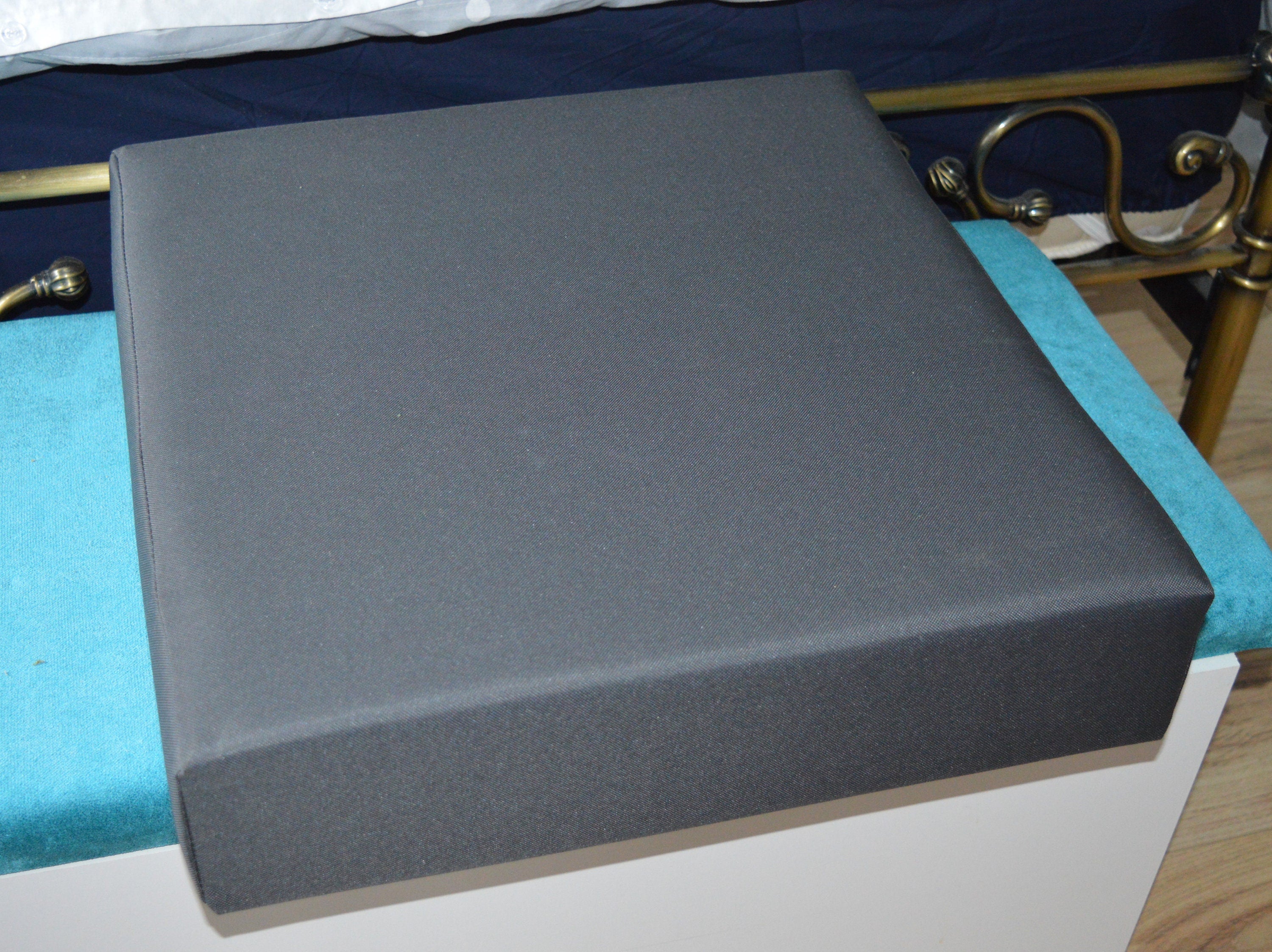 Booster Seat Cushion Upholstered In A Dark Grey  Water Resistant Fabric With A  Firm Foam Filling