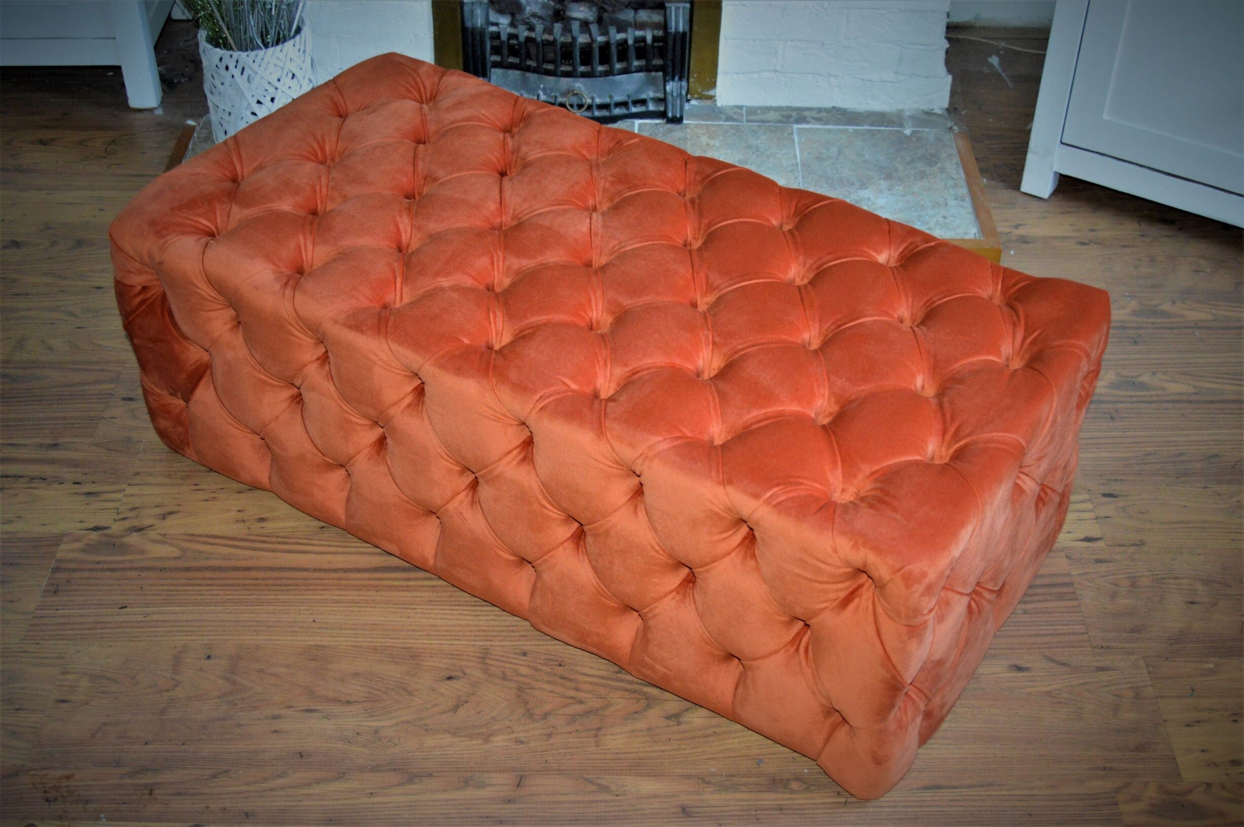 Chesterfield Style Deep Buttoned All Over Extra Large Footstool Upholstered In a Plush Burnt Orange Velvet