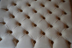 Square Chesterfield Style Deep Buttoned Footstool in Casino Beige  Fabric With Turned Hard Wood Legs