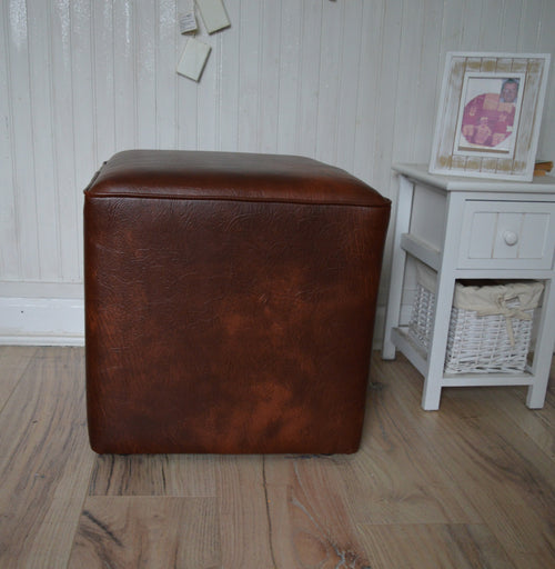 A Stylish  Cube Design footstool footrest upholstered in a Premium Chestnut Faux Leather