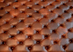Chesterfield Extra Large Deep Buttoned Footstool in Premium Chestnut Faux Leather With Mahogany Turned Hardwood Legs