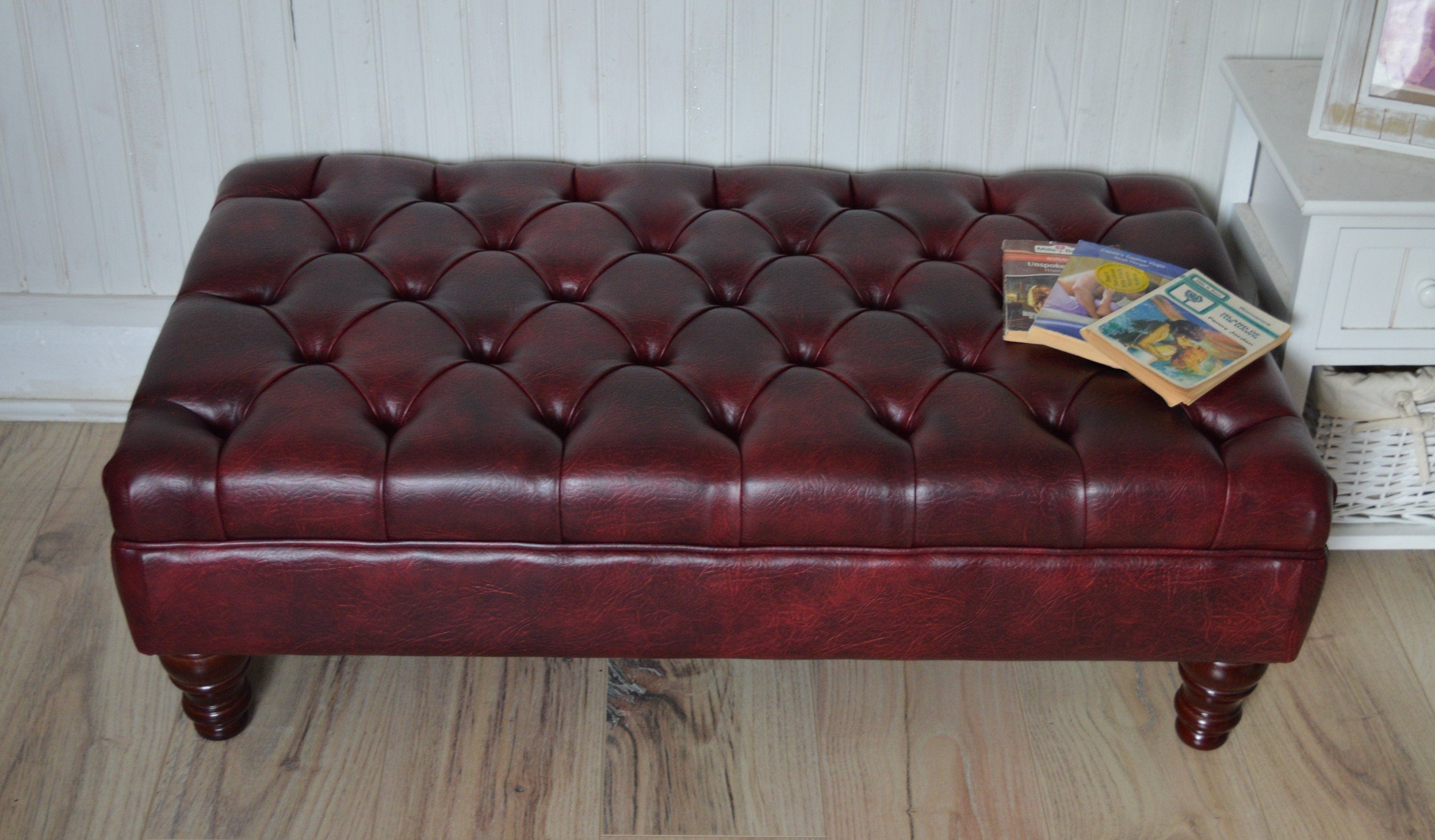 Chesterfield Style Deep Buttoned Footstool in Premium Wine Faux Leather With Turned Mahogany Hardwood Legs