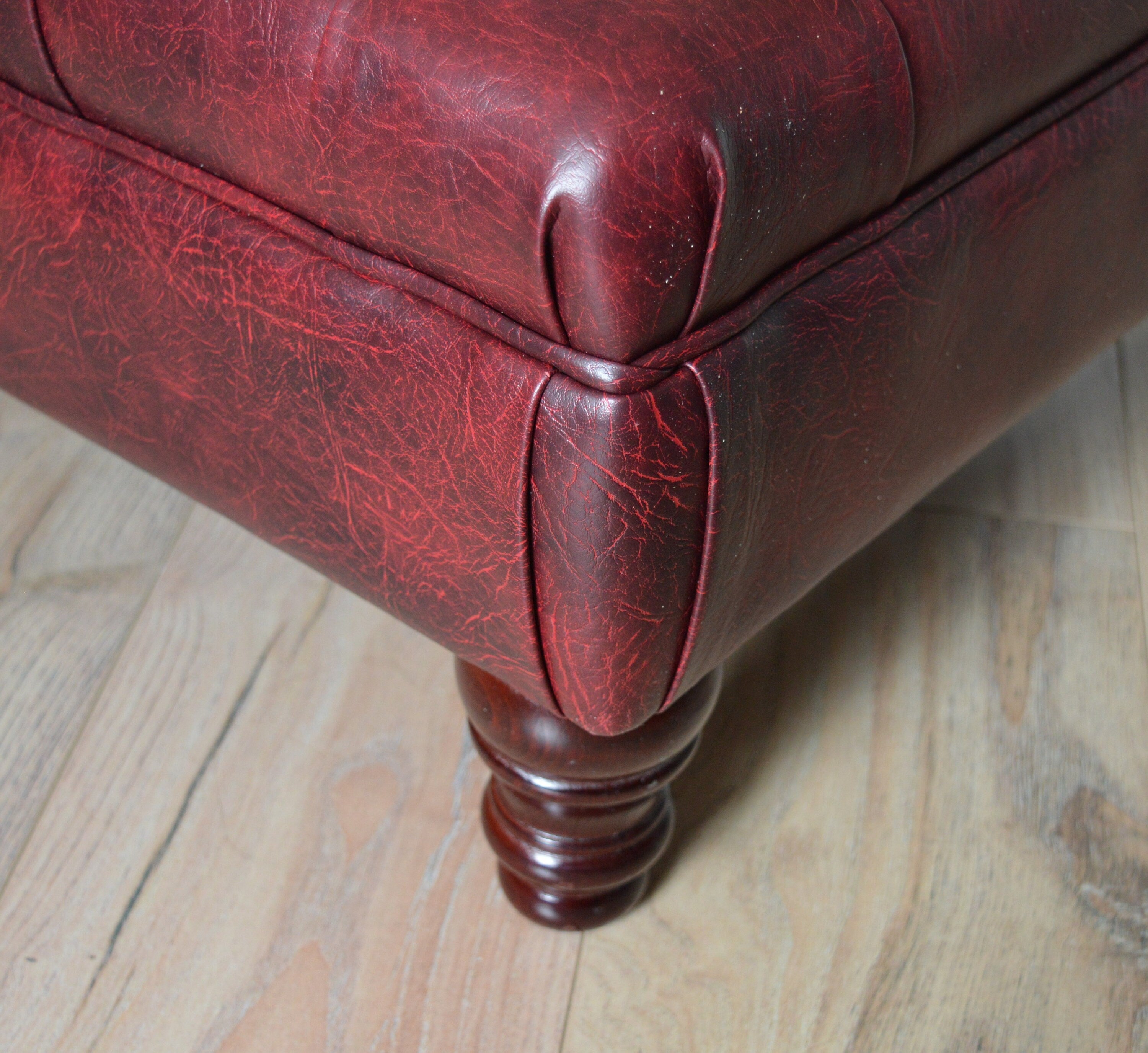 Chesterfield Style Deep Buttoned Footstool in Premium Wine Faux Leather With Turned Mahogany Hardwood Legs