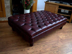 Chesterfield Extra Large Deep Buttoned Footstool in Premium Wine Faux Leather With Turned Hardwood Legs