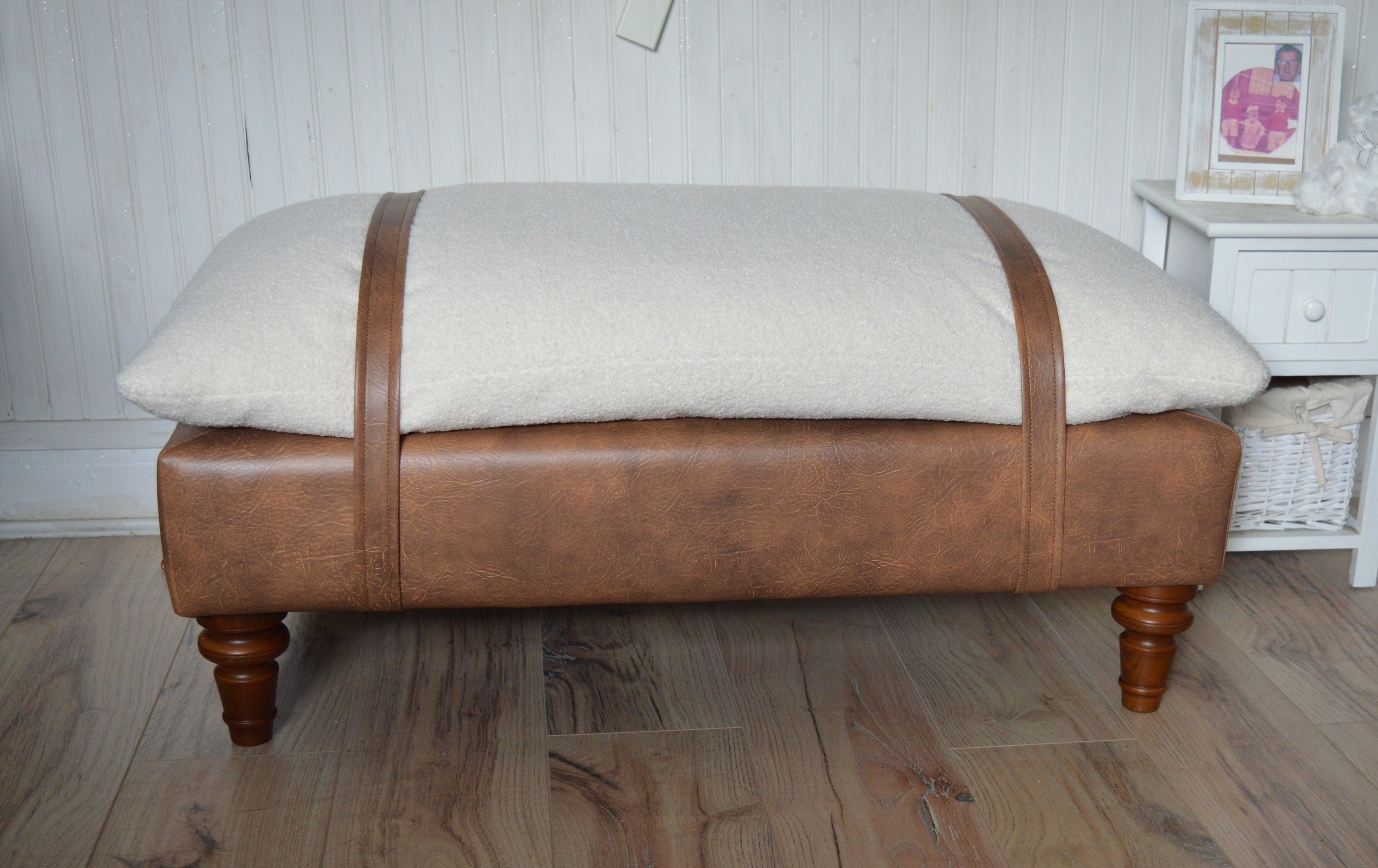 Mayfair Footstool  in Ivory Boucle Fabric And Premium Tan Faux Leather With Dark Oak Legs.