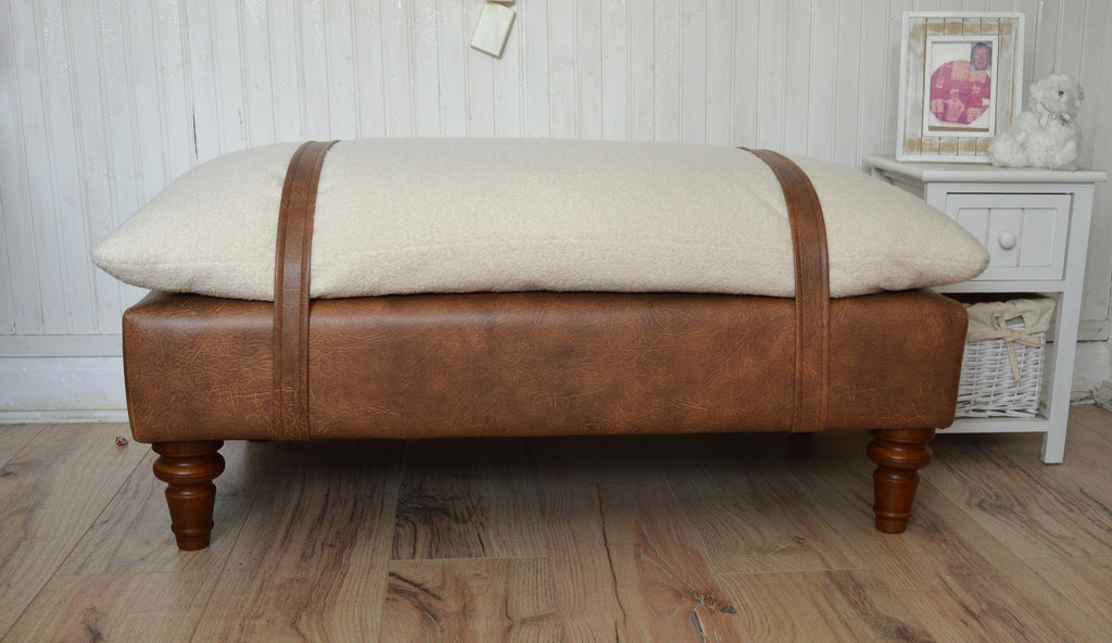 Mayfair Footstool  in Ivory Boucle Fabric And Premium Tan Faux Leather With Dark Oak Legs.